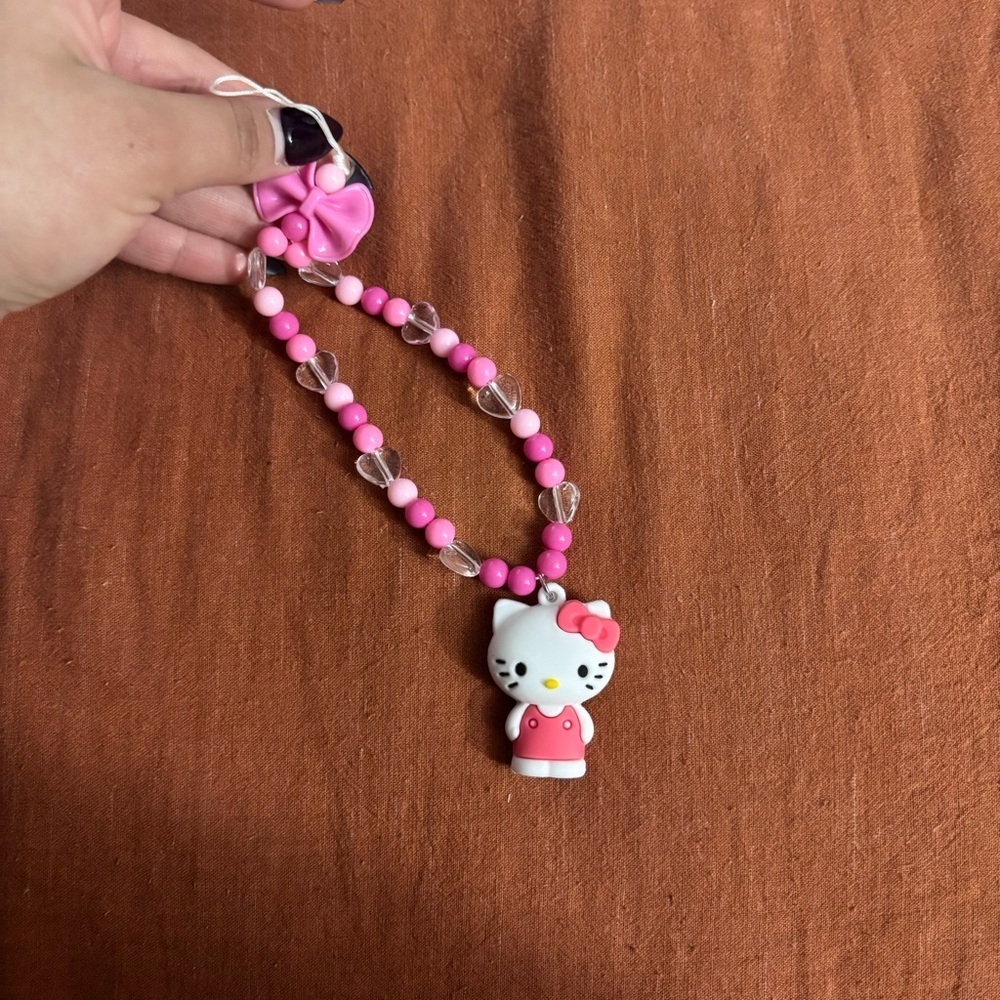 NWT Sanrio Hello Kitty Bow Phone Wristlet Pink - Picture 4 of 9